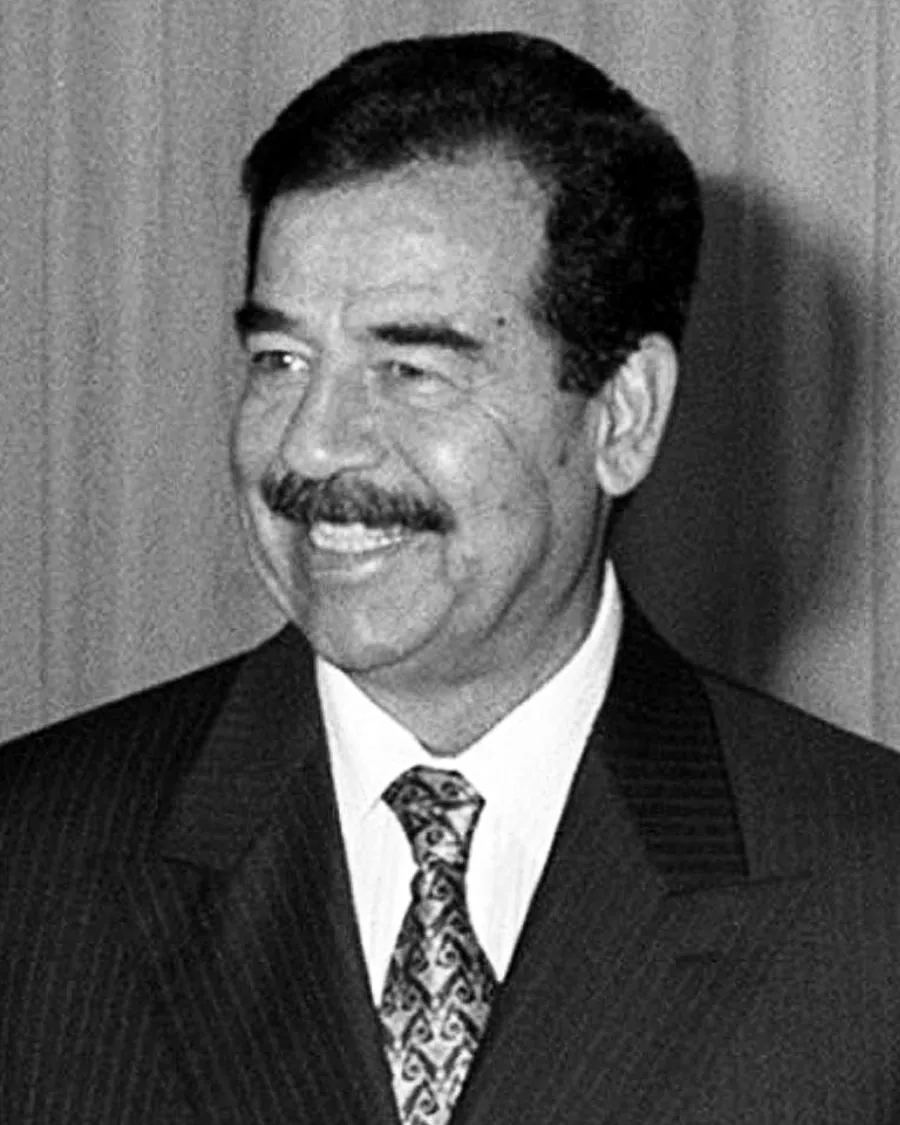 Saddam Hussein smiling, 1998